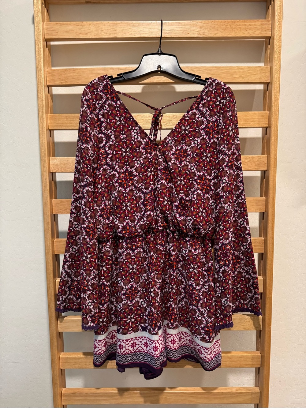Takara Burgundy Floral Wrap-Front romper with bell sleeves